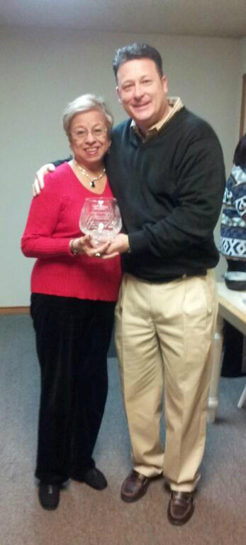 ComponentMfg1's tweet photo. Ty presents Rosario Renteria with her Rose Bowl for her 50 years of service &amp; dedication to the Company! Congrats Rose! http://t.co/bOHtkU3R