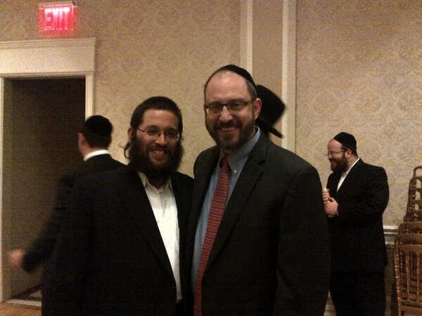 Senator Simcha Felder making shulim with pinny ringel former campaign manager of Ex-Sen David Storobin. photo: