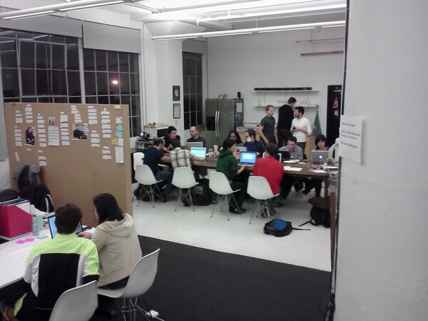 protonight's tweet photo. Pic from last night's Proto Night: pair programming + pizza = win http://t.co/TapXMzn5