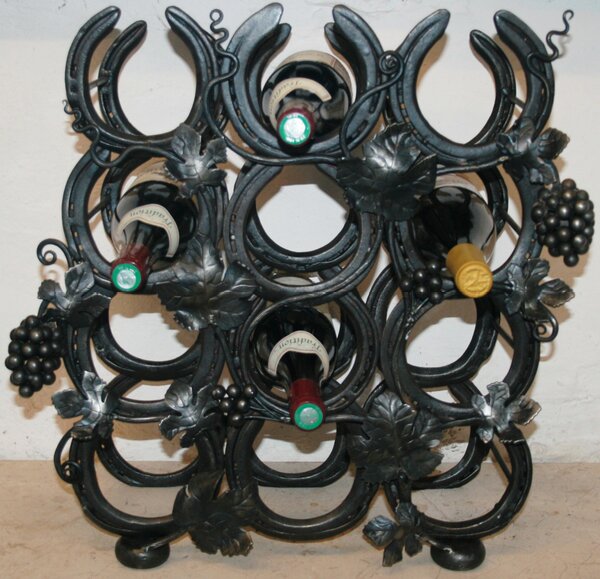 AllerfordForge's tweet photo. Wine racks made by http://t.co/hZOH3ZAZ
This picture sows a 9 bottle wine rack which was made using reclaimed shoes http://t.co/qJqagSoN