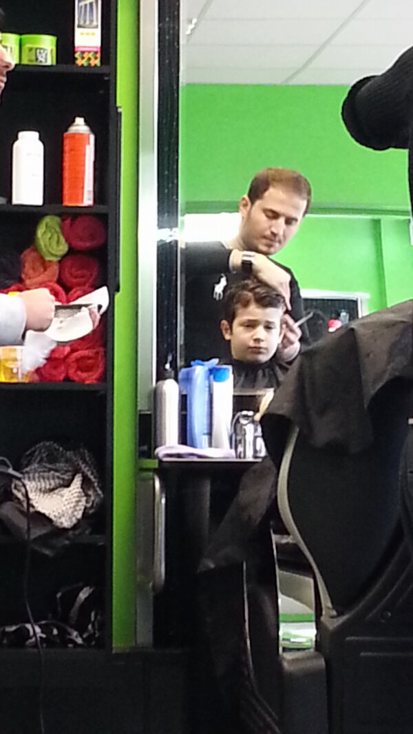 denizmatur's tweet image. Lol Hazar getting a haircut, he looks so miserable! #NotLikingIt