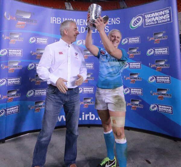 USARugby's tweet photo. #USARugby CEO @NigelMelville awards #Houston7s MVP Trophy to Eng's @Hfisher2012. And yes, it IS a Silver Cowboy Boot! http://t.co/LOGDrJwy