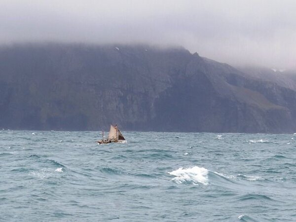 The Alexandra Shackleton approaches South Georgia as fog lifts at the end of the first leg of the historic re-enactment