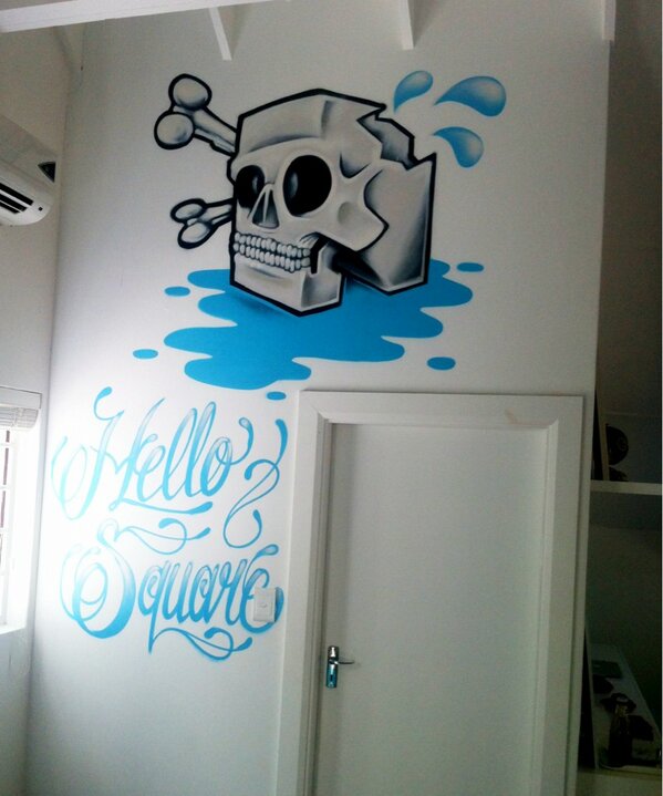 thatManning's tweet photo. @CaptainJase popped into the office to keep me company today. He got bored and decided to paint our wall. SoTalented! http://t.co/JZC6hr0q