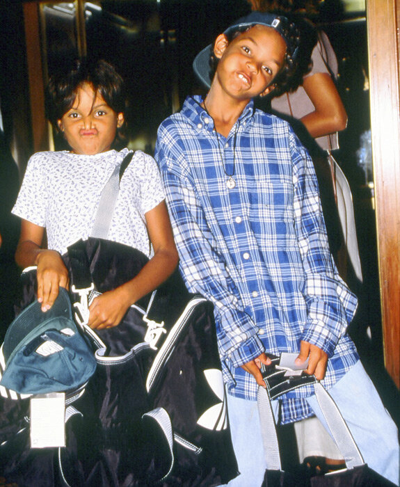SI Vault on X: A very young Joakim Noah and his sister pose for the  camera:  / X