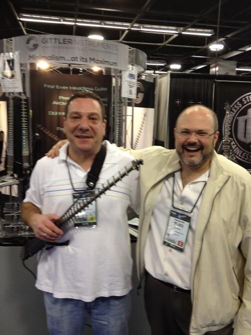 PrecAssemTech's tweet image. Robert Martini and Russ Rubman, President of Gittler Instruments at the NAMM 2013 show.