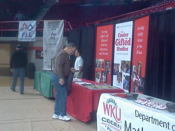 firstlegoleague's tweet image. A spectator checks out host WKU’s table at the KY #FLL Championship. #seniorsolutions