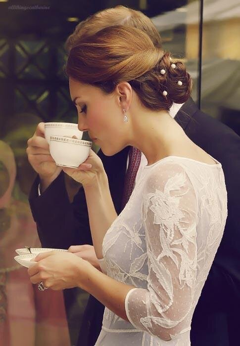 myteabreak's tweet photo. The Duchess of Cambridge enjoying a nice cup of Tea. http://t.co/GCWs2clT