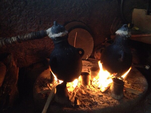 Home brewed barley spirits  in Ethiopia. Takes three days to finish. Smokey! For Laphroaig lovers perhaps...