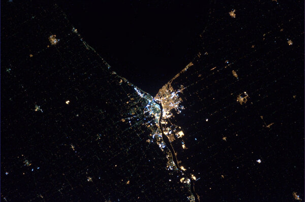 Cmdr_Hadfield's tweet photo. Sarnia, Ontario, the town of my birth. So great to see the lights of home in the night. http://t.co/APC28yVO