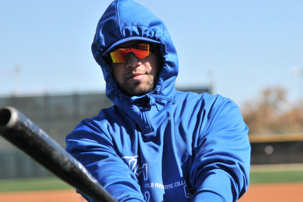 Catcher Manuel Pina gets ready to take some BP on a chilly, blustery day in Surprise.  #RoyalsST