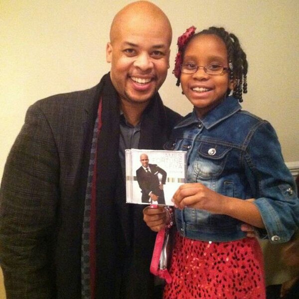 staceye815's tweet photo. My baby at her first concert. @MrJamesFortune http://t.co/XCkTMQp9