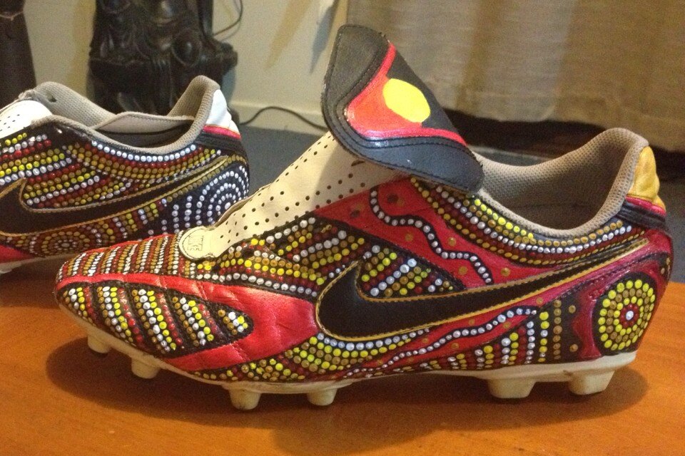 aboriginal painted football boots