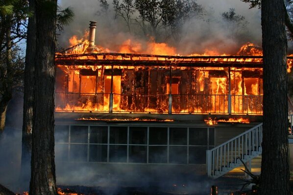 CFTactics's tweet photo. Two St. House Fire on Pensacola Bay starts 7 acre brush fire. FIrefighters had to battle high winds &amp; water supply. http://t.co/GohlLDY2