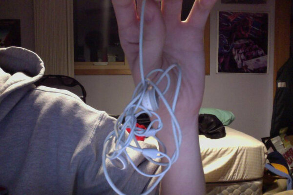 Another great entry into our contest! Post a photo of your tangled earbuds and you could win  facebook.com/SmarterStand