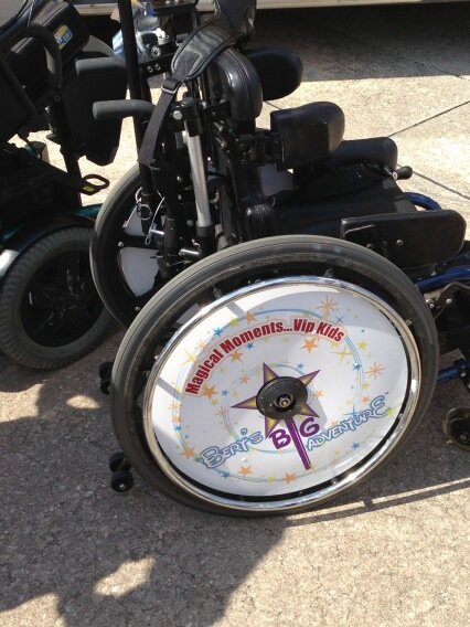 BertShowBert's tweet image. This is what I mean about @bertsbigadv staff thinking of every small detail. Wheelchair hubcaps! #bba2013