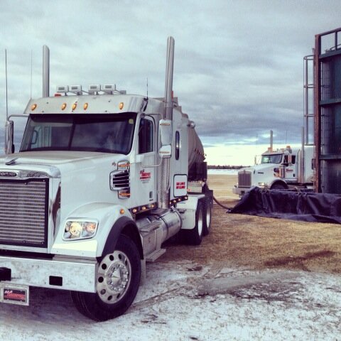 RCMTransport's tweet photo. Truck drivers scatter when there's pictures to be taken! Unit 107 (front) and 105 (back) north of Sundre. http://t.co/y2n8mdOLId