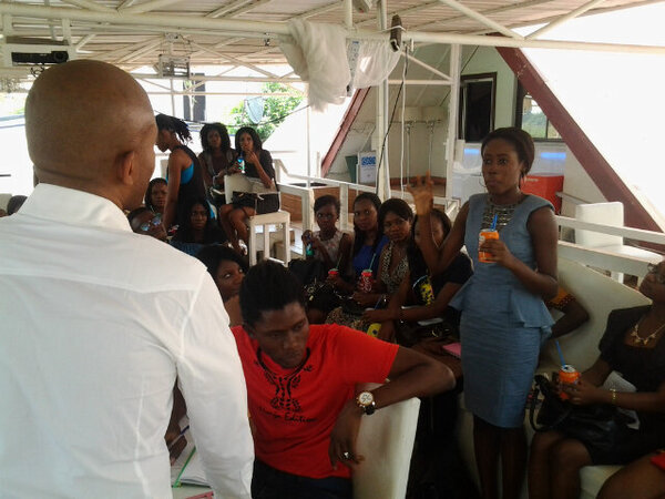 itsMrCornells's tweet photo. Another attendee @EvelynTailor making a point 2 @emmycollins while every1 listens cc: @beeba_77 @NaijaEdition http://t.co/d5GzpydljT