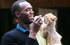 davis_winkie's tweet photo. Usain Bolt and his newborn son http://t.co/74vbcQQ1ll