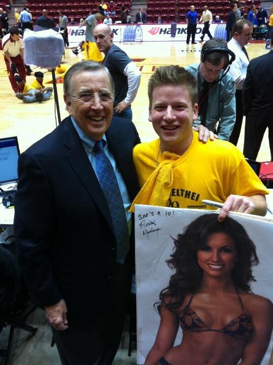 Brent Musburger autographs Iowa State fan's Katherine Webb poster (Photo)