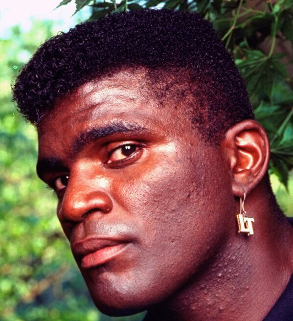 SI Vault on X: Nobody rocks the initials earring quite like