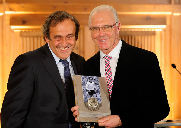 FCBayern's tweet photo. Congrats! Franz @Beckenbauer was honoured by Michel #Platini with the #UEFA President's Award. http://t.co/JNzdAAY6oW http://t.co/3TdWp8v2LU