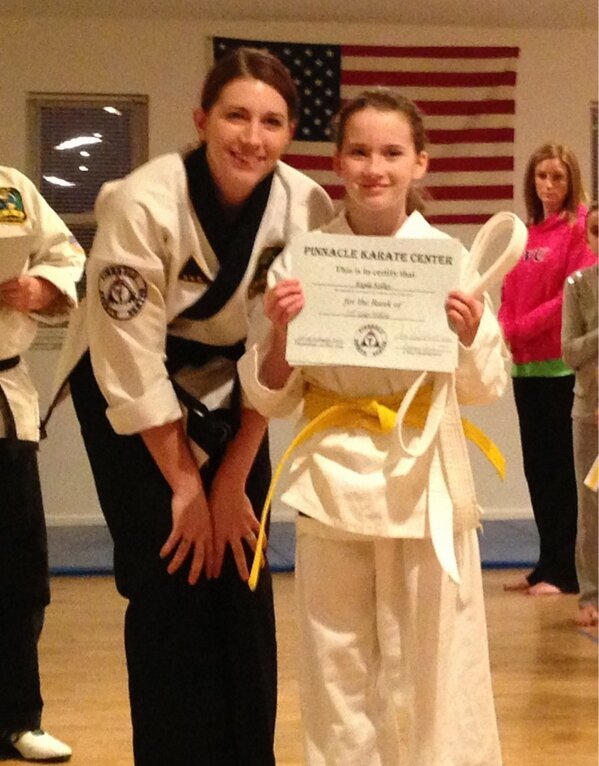 Kayla was doubled promoted in karate tonight. Go Kayla!!!!