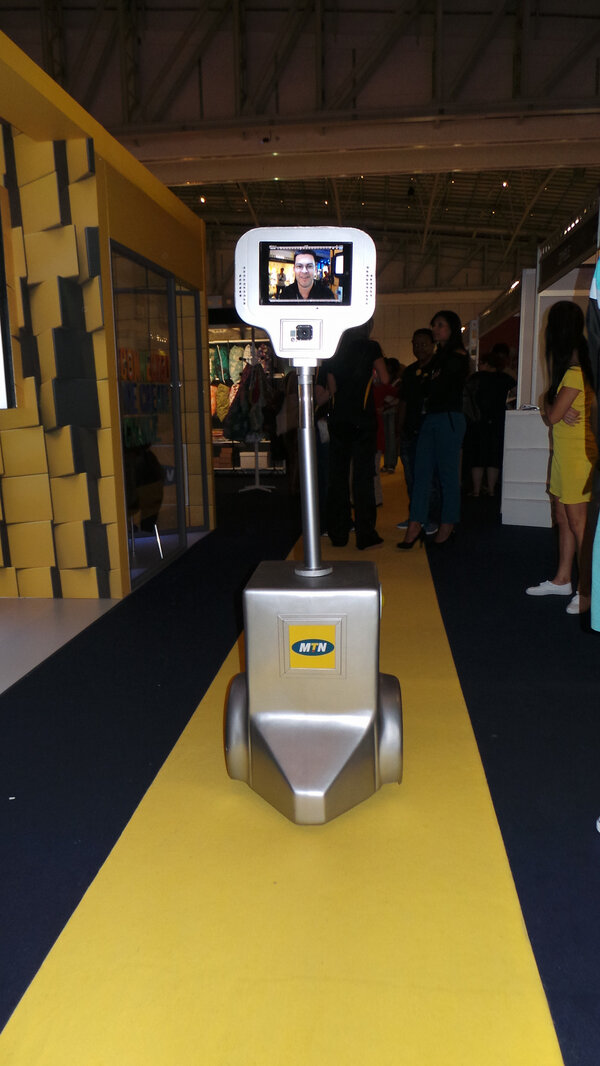 MTNza's tweet photo. Walk down the Yello Carpet @designindaba Expo this weekend and come say 'Hi' to our Connector Bot #MTNConnectCreate http://t.co/wmsTcY0EEy
