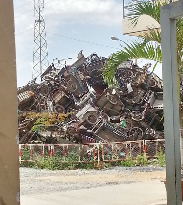 genochio's tweet photo. don't what this type of motorbike is called but there's a graveyard for them.  Shared via #Fotor http://t.co/bKKn1XbNao
