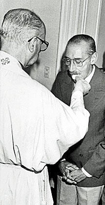 Please tell me this wasn't the "New Pope" giving Communion to Argentine Dictator/Butcher Jorge Rafael Videla.