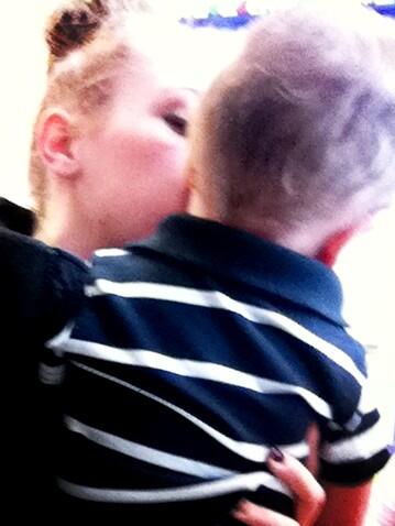 My beautiful niece with Jacob as he gives her hugs for her 22nd birthday after gifts.