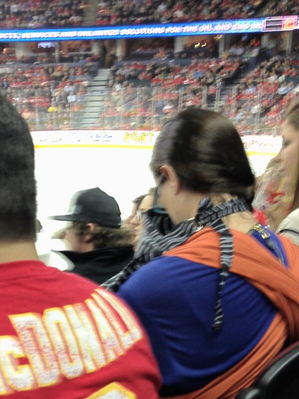 matt_v_i's tweet photo. Got milk? #flames breast feeding at the hockey game. All class http://t.co/UNtuIr9eXT