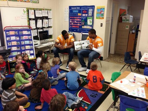 Antone_Davis's tweet photo. UT Vols getting it done in the classroom. Today we are at Bearden Elementary reading to young Vols. #VFL!! http://t.co/3iVmRES8Xm