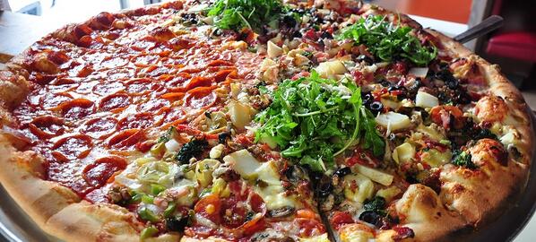 FiddleheadPizza's tweet image. The threshold has been established! A 30" pizza topped with all of our topping on 2/3rds of the pie! Ya gotta see it!