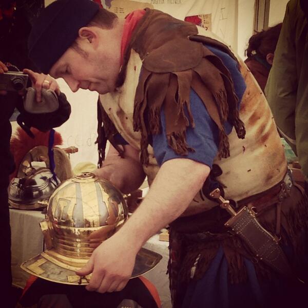 Eddington_Camb's tweet image. Kids get to try on the head gear at the Roman street party/ archaeology dig at north west Cambridge #csf2013