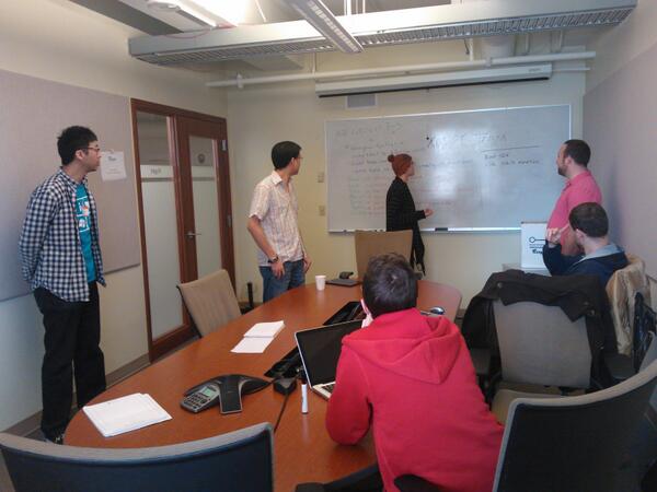 OhKinect's tweet photo. Our team in the middle of a brainstorming session this morning. Can't wait for day 3 of #autismhack! http://t.co/NprSiYyPTC