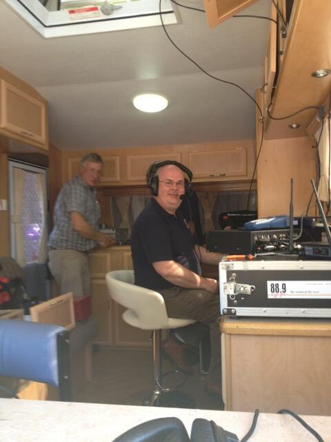889WYNFM's tweet photo. The epicentre! @nrm59 pushing the buttons :-) Tech Guru Peter White looking on. #communityradio #ob #weerama http://t.co/sjMqxrYOXN