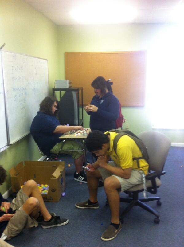 coco1409's tweet photo. CCA students working hard stuffing eggs for @CalvaryFL Easter Egg Hunt http://t.co/wjhkKk8tcM