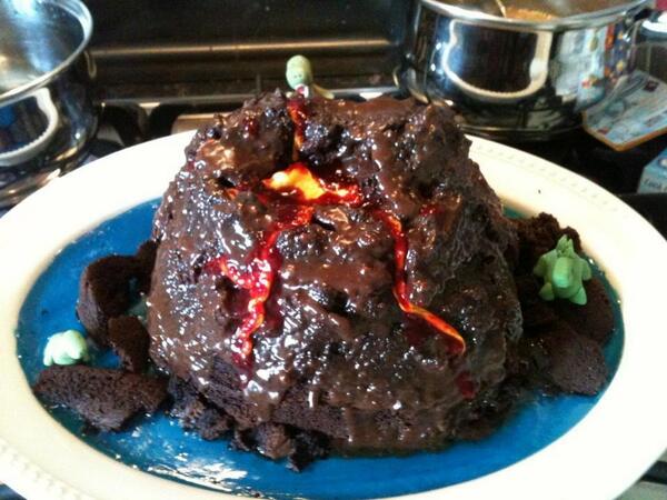 We made a volcano cake with dinosaurs!!!