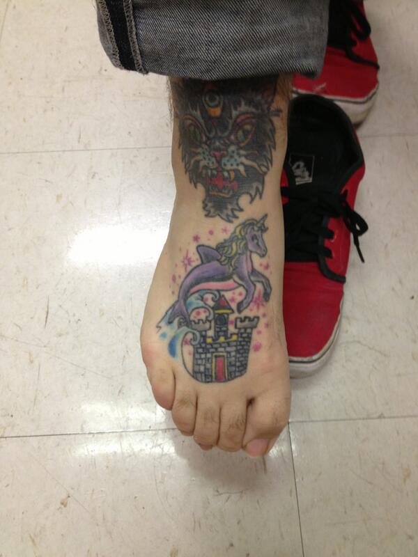 BAVARIAN_BLAKE's tweet photo. Dolficorn tattoo probably the coolest thing in my office #tattoo #original #yolo http://t.co/zPqdfyxfpf