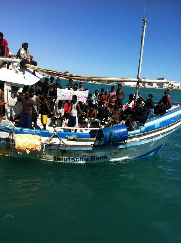 abcperth's tweet photo. Extraordinary images as boat carrying asylum seekers pulls into Geraldton,  http://t.co/F3ZKtjLvp9 http://t.co/OVLTG3apSL