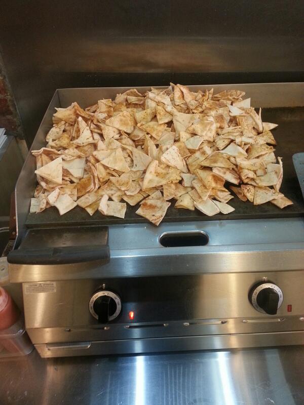 Pita chips are baking! Better come in later and try them out can you guess what spice is on them #pitachips