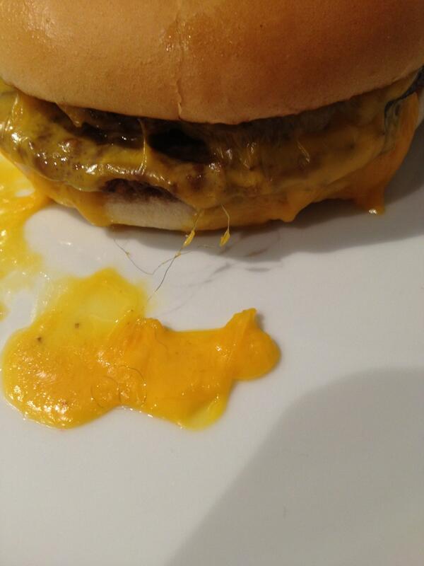 MRooberts's tweet photo. @McDonalds I felt sick after finding the most disgusting hair in the cheese of my burger today after reheating!! http://t.co/q8LBwkQLDi