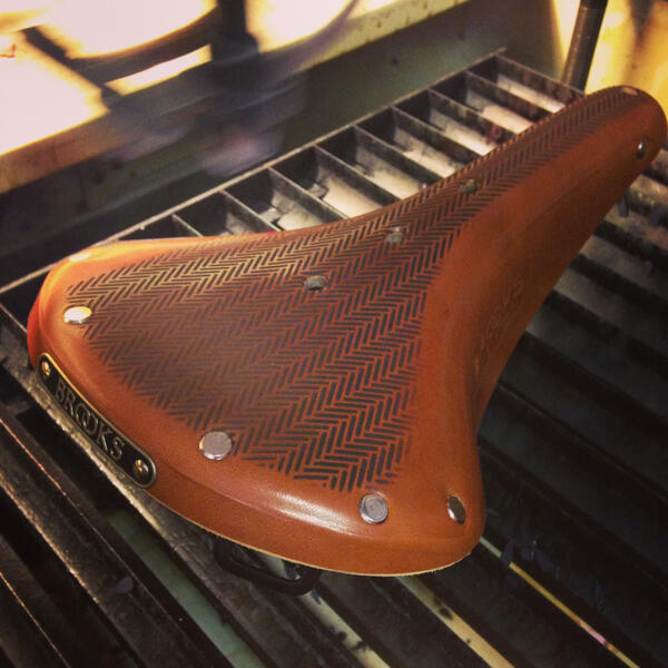 lasercutstudio's tweet image. Preview of our laser engraved brooks saddle, available this summer from Laser Cut Studio  #laserengraved #brooks