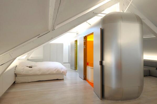 designboom's tweet photo. architect transforms abandoned industrial bakery into a futuristic loft home in belgium: http://t.co/ts5unShMSC http://t.co/mxafKxvQFl