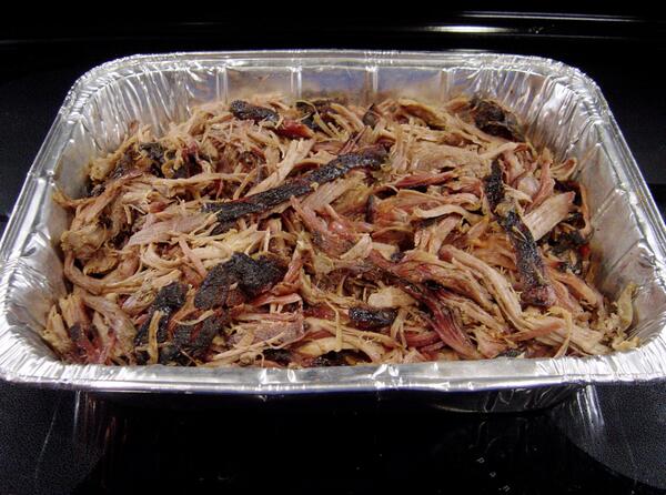 Pulled Pork ready for sandwiches and some vingar sauce.