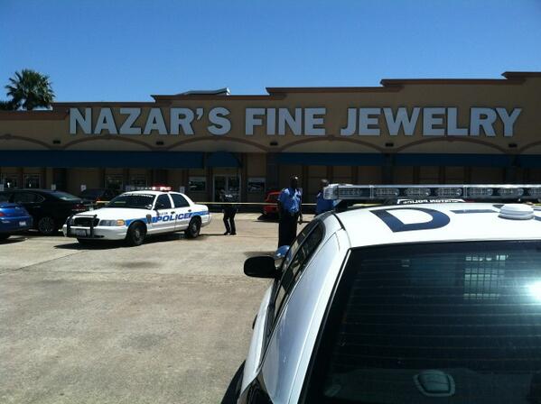 KHOU's tweet photo. RT @MaliniKHOU Off-duty officer shot suspect who was trying to rob #Nazars fine jewelry on Westheimer #khou #hounews http://t.co/nAWCaUClwk