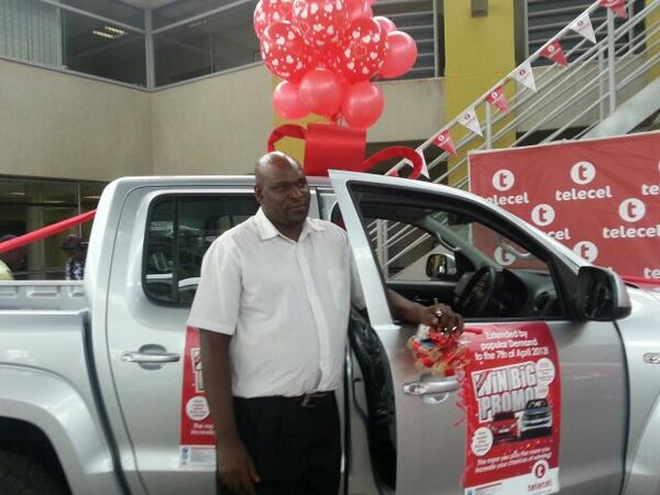 Telecel_Zim's tweet photo. #VWAmarok winner Brian Chada posing with his new car. #WinBigPromo #TellSomeone http://t.co/CuXHFWey10