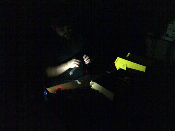 No power? No problem! Steve assembling parts by iPhone light. #dedication