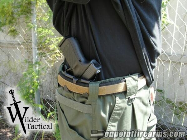 WilderTac's tweet photo. Evan at http://t.co/9Hrpc7aZ08 modeling out patented tri-lock IWB holster. http://t.co/qB2sNQbaCC